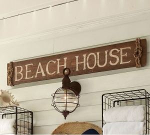 large beach house sign